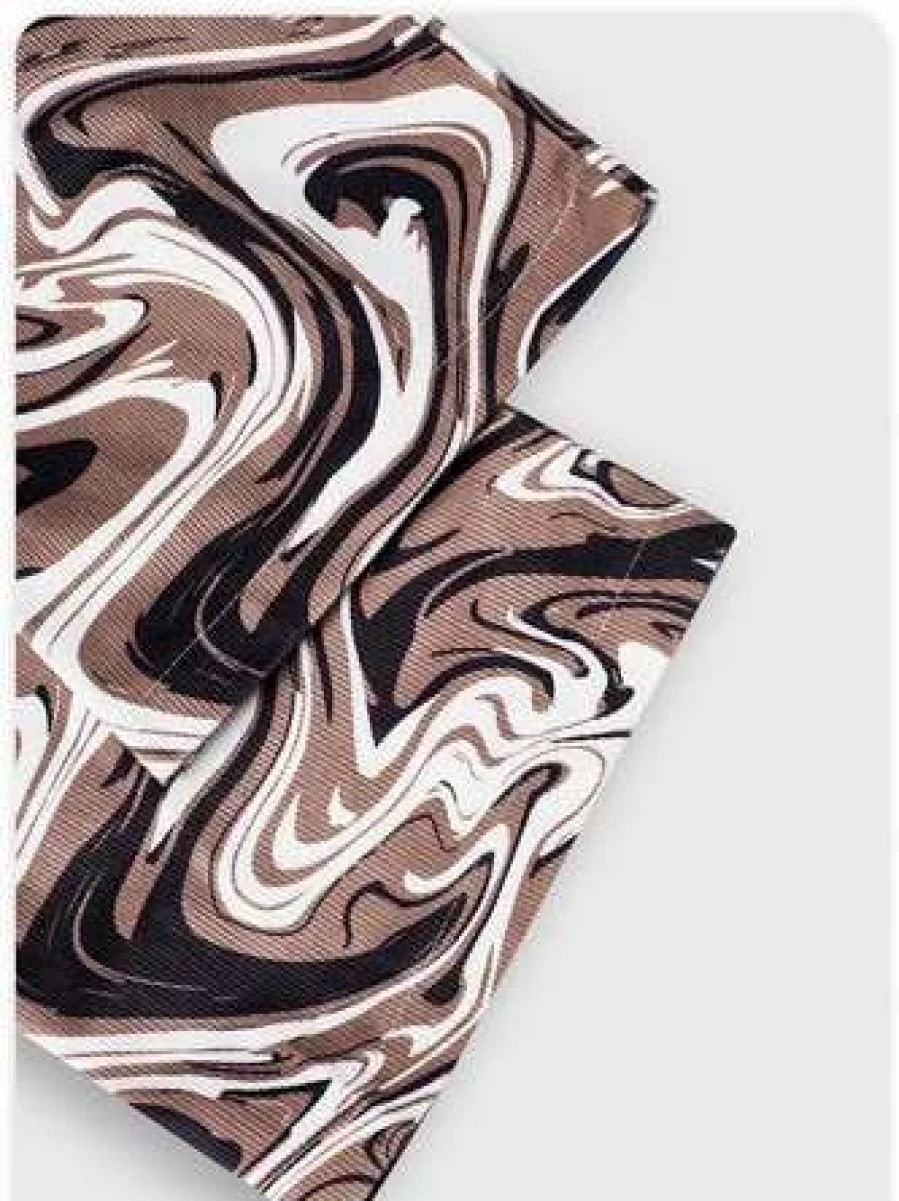 Y2K Water Wave Flared Pants in White and Brown Retro Print