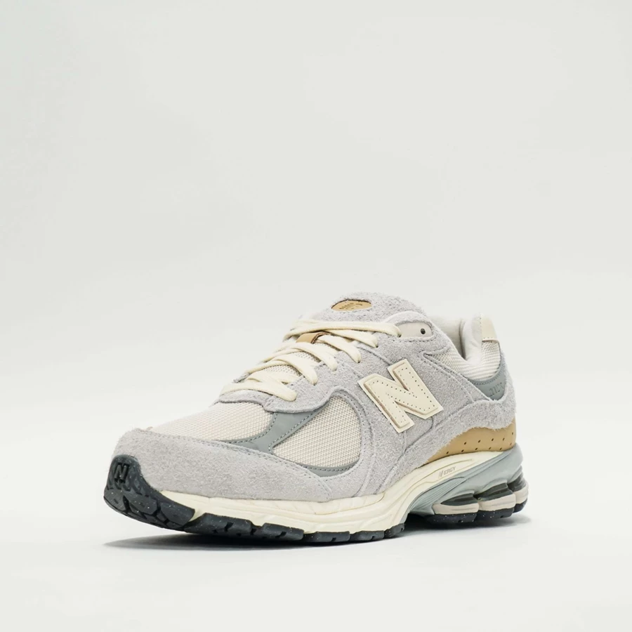 New Balance 2002R Sneakers in Rain Cloud/Angora - Retro Running Shoes for Men & Women